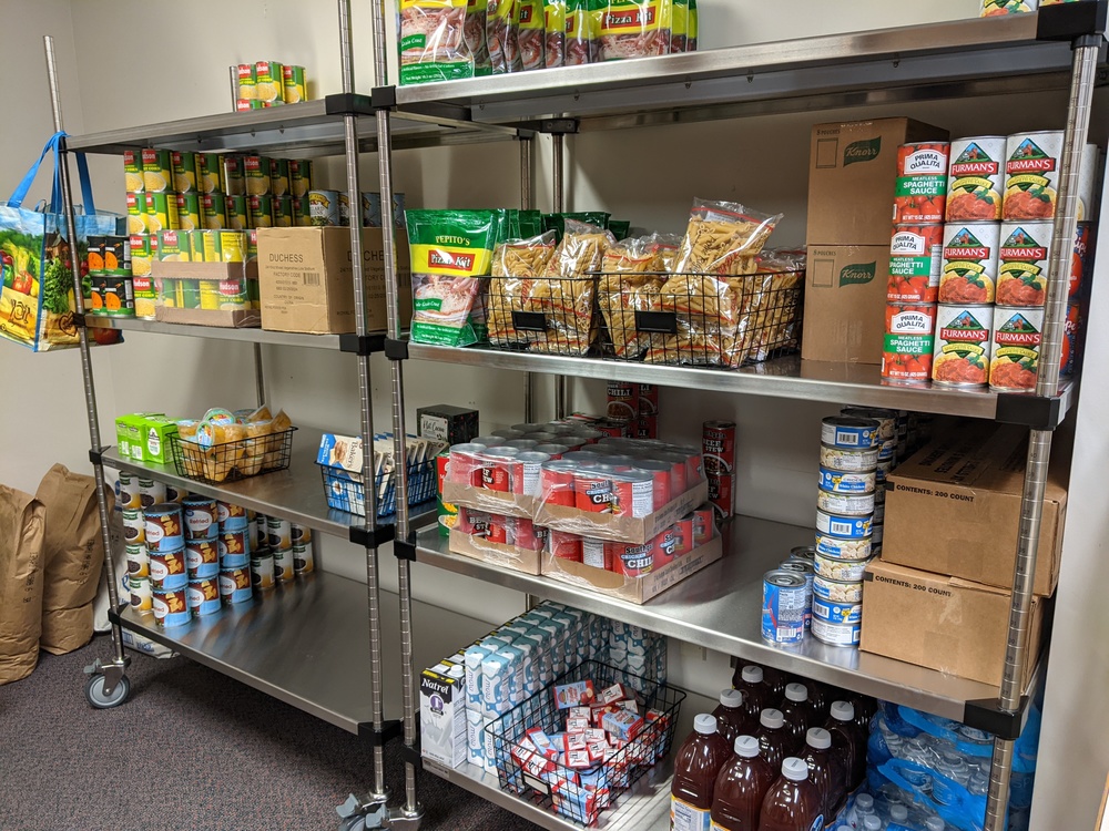 food pantry shelves stocked with food