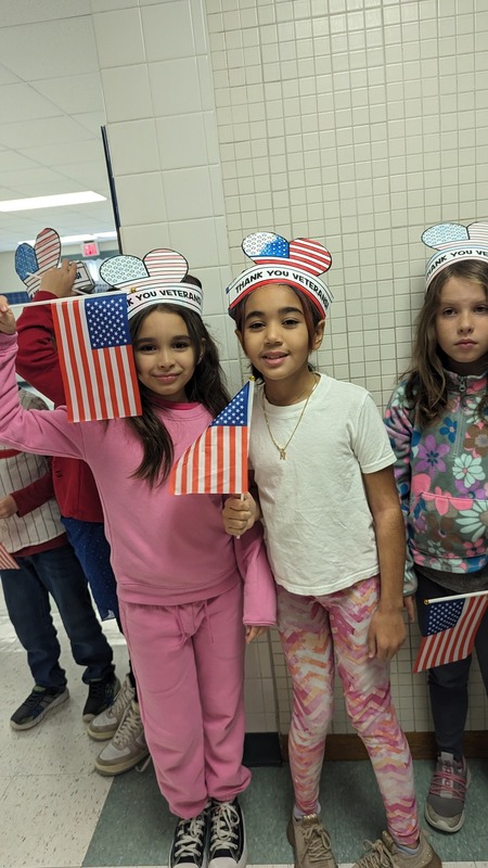 Flags and Cheers from our Elementary Students